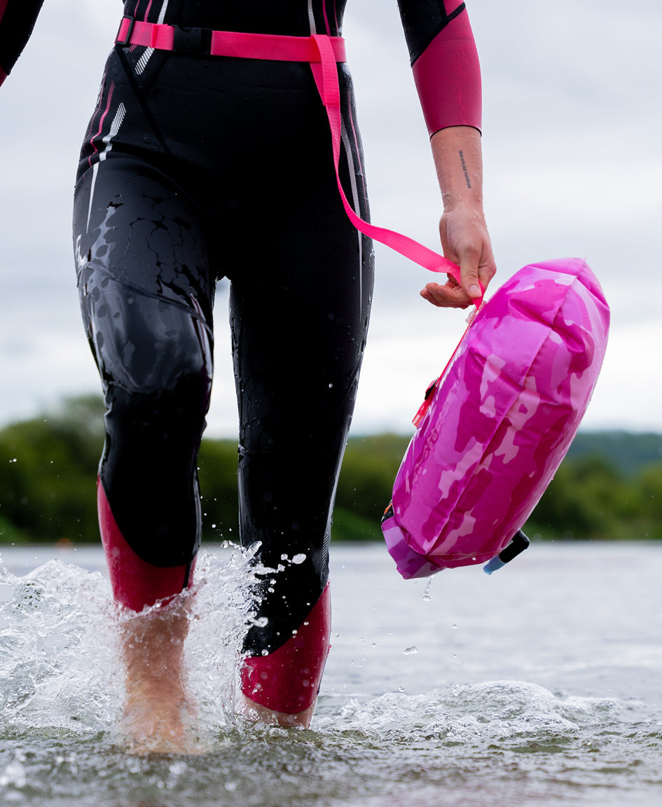 UUB Safety Tow Float pink camo inflatable open water swim buoy, 16L waterproof with waist belt and whistle